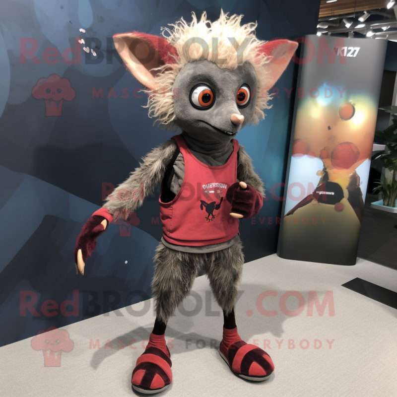 Rust Aye-Aye mascot costume character dressed with a Yoga Pants and Shoe laces Rust Aye-Aye mascot costume character dressed with a Yoga Pants and Shoe laces