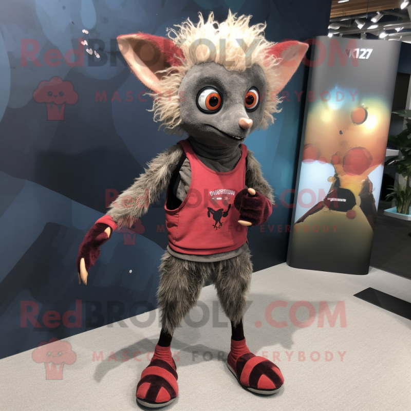 Rust Aye-Aye mascot costume character dressed with a Yoga Pants and Shoe laces