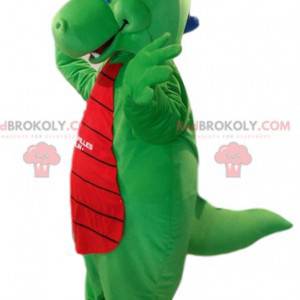 Mascotte drago verde e rosso molto sorridente. Costume da drago