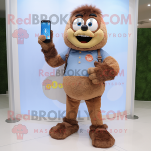 Brown Apricot mascot costume character dressed with a Denim Shorts and Digital watches