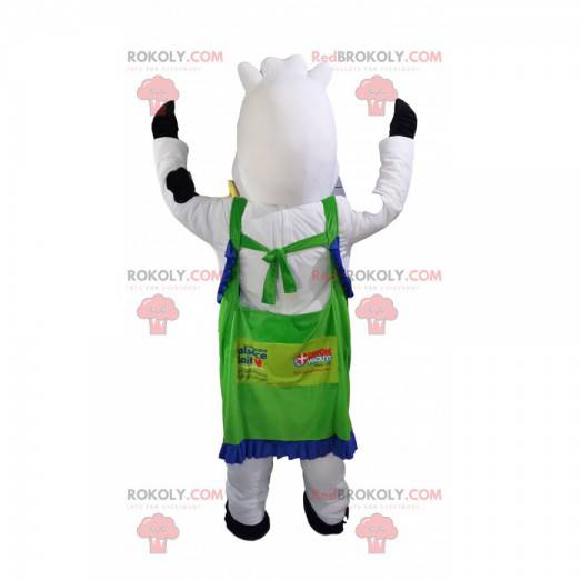Mascot white and black cow with a green apron. - Redbrokoly.com