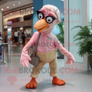 Peach Flamingo mascot costume character dressed with a Chinos and Eyeglasses