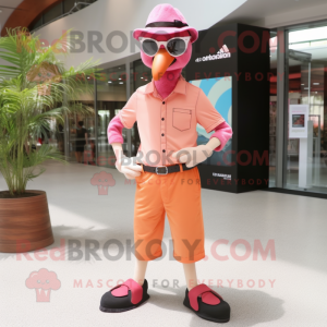 Peach Flamingo mascot costume character dressed with a Chinos and Eyeglasses