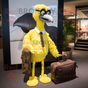 Lemon Yellow Ostrich mascot costume character dressed with a Blazer and Messenger bags