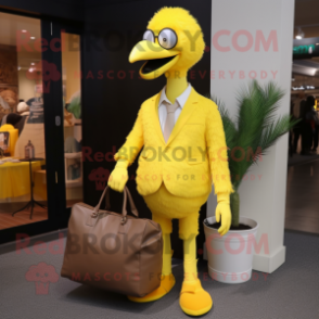 Lemon Yellow Ostrich mascot costume character dressed with a Blazer and Messenger bags