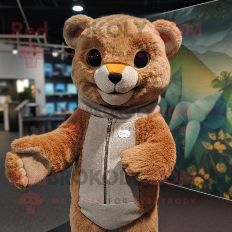 Tan Jaguarundi mascot costume character dressed with a Cardigan and Mittens Tan Jaguarundi mascot costume character dressed with a Cardigan and Mittens