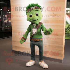 Forest Green Momentum mascot costume character dressed with a Skinny Jeans and Bracelet watches