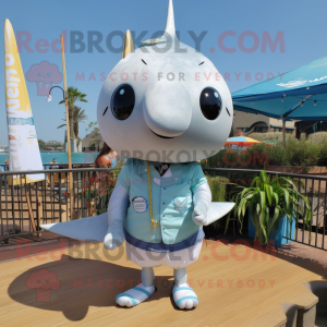 Silver Narwhal mascot costume character dressed with a Board Shorts and Tie pins