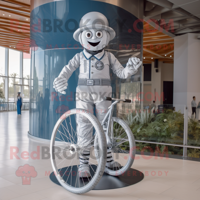 Silver Unicyclist mascot costume character dressed with a Jumpsuit and Ties Silver Unicyclist mascot costume character dressed with a Jumpsuit and Ties