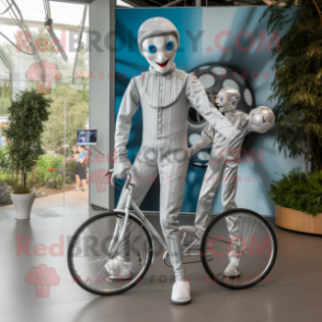 Silver Unicyclist mascot costume character dressed with a Jumpsuit and Ties