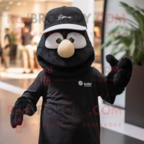 Black Aglet mascot costume character dressed with a Henley Shirt and Caps