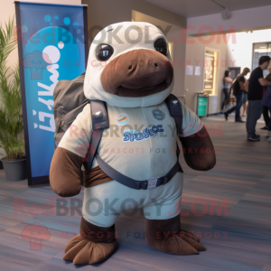 Rust Stellar'S Sea Cow mascot costume character dressed with a Polo Tee and Backpacks