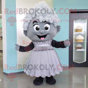 Gray Cupcake mascot costume character dressed with a Shift Dress and Belts