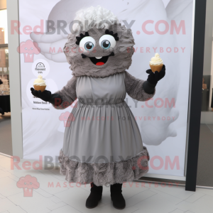 Gray Cupcake mascot costume character dressed with a Shift Dress and Belts