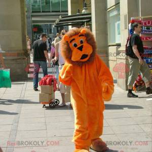 Leuke en harige oranje en bruine leeuw mascotte - Redbrokoly.com