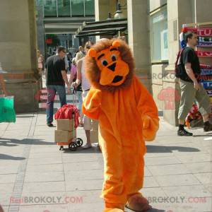 Mascotte de lion orange et marron mignon et tout poilu -