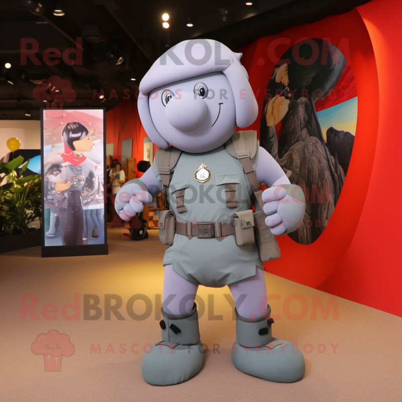 Gray Commando mascot costume character dressed with a Mini Skirt and Keychains Gray Commando mascot costume character dressed with a Mini Skirt and Keychains