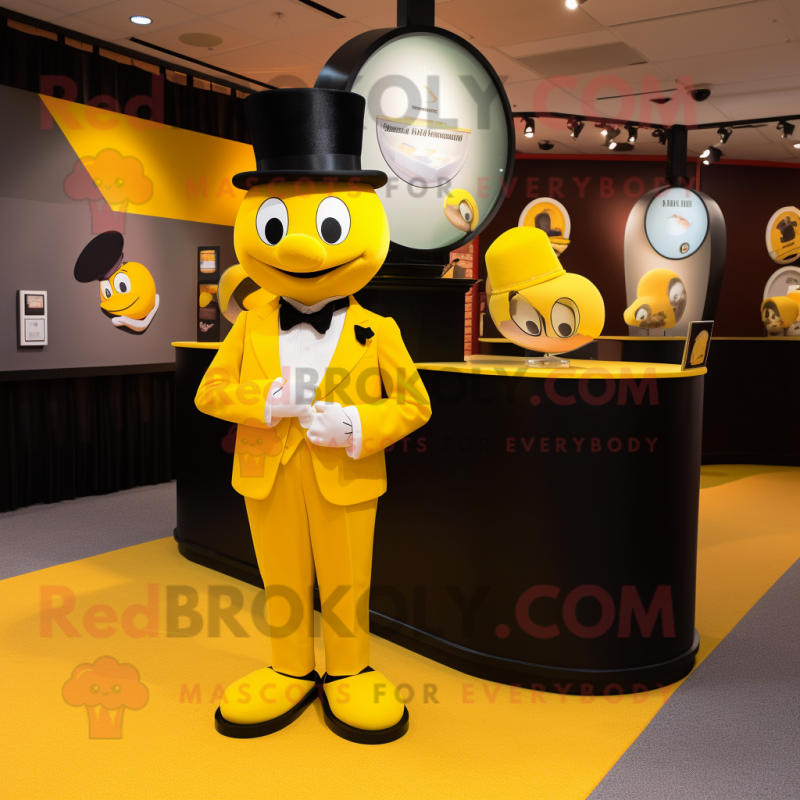 Yellow Momentum mascot costume character dressed with a Tuxedo and Coin purses Yellow Momentum mascot costume character dressed with a Tuxedo and Coin purses