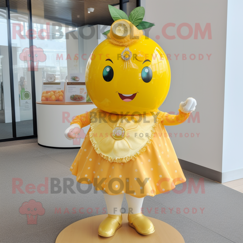 Gold Grapefruit mascot costume character dressed with a Mini Skirt and Brooches Gold Grapefruit mascot costume character dressed with a Mini Skirt and Brooches