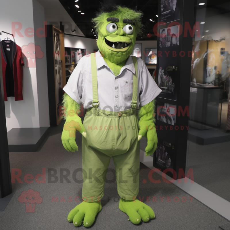 Lime Green Frankenstein'S Monster mascot costume character dressed with a Button-Up Shirt and Cummerbunds Lime Green Frankenstein'S Monster mascot costume character dressed with a Button-Up Shirt and Cummerbunds