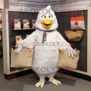 White Hens mascot costume character dressed with a Corduroy Pants and Tote bags
