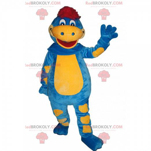 Mascote de dinossauro azul e amarelo com um puff vermelho -