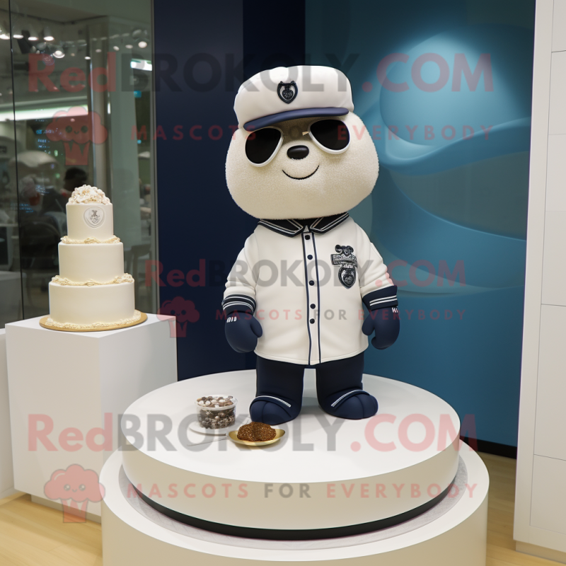 Navy Wedding Cake mascot costume character dressed with a Hoodie and Keychains Navy Wedding Cake mascot costume character dressed with a Hoodie and Keychains