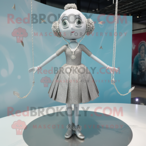Silver Tightrope Walker mascot costume character dressed with a Skirt and Keychains