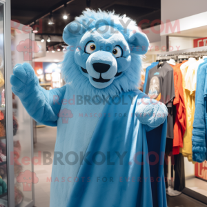 Sky Blue Lion mascot costume character dressed with a Graphic Tee and Wraps