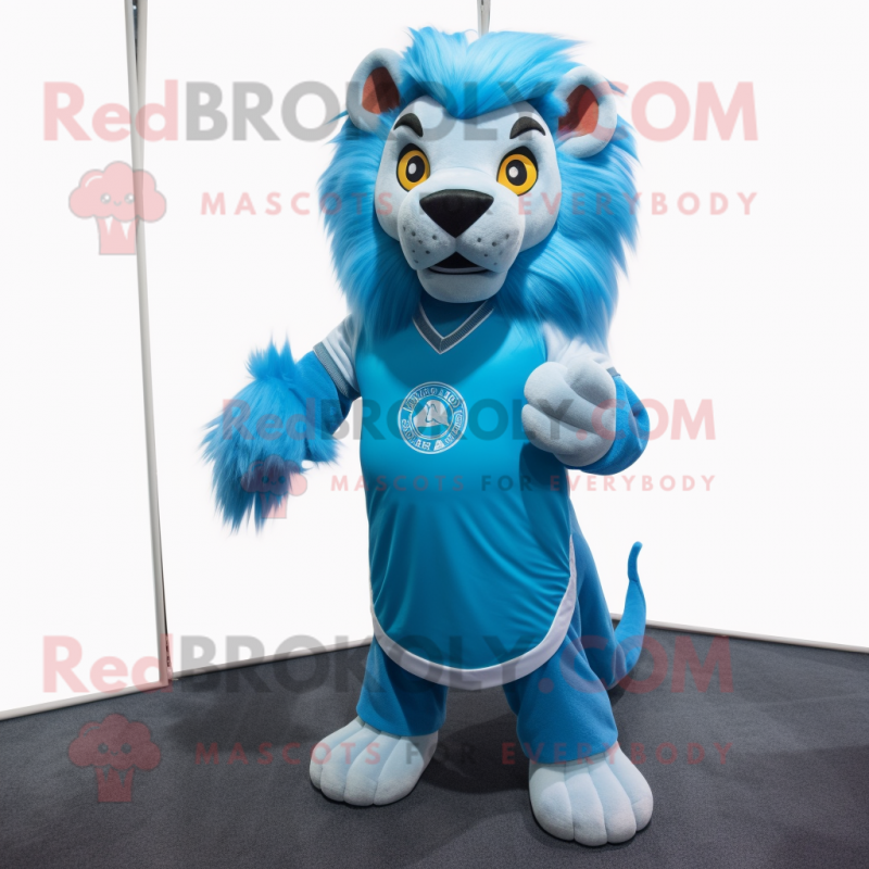 Sky Blue Lion mascot costume character dressed with a Graphic Tee and Wraps