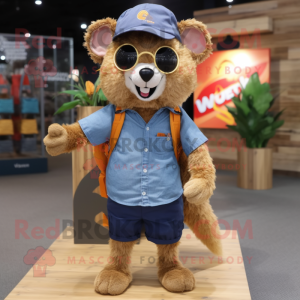 Gold Mongoose mascot costume character dressed with a Denim Shorts and Hair clips