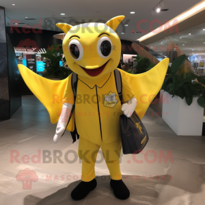 Yellow Manta Ray mascot costume character dressed with a Waistcoat and Wallets