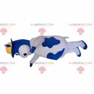 Mascotte mucca blu e bianca con un cappello giallo -