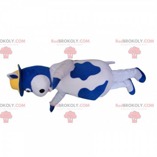 Mascotte mucca blu e bianca con un cappello giallo -