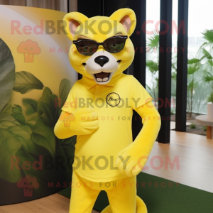 Lemon Yellow Thylacosmilus mascot costume character dressed with a Tank Top and Eyeglasses