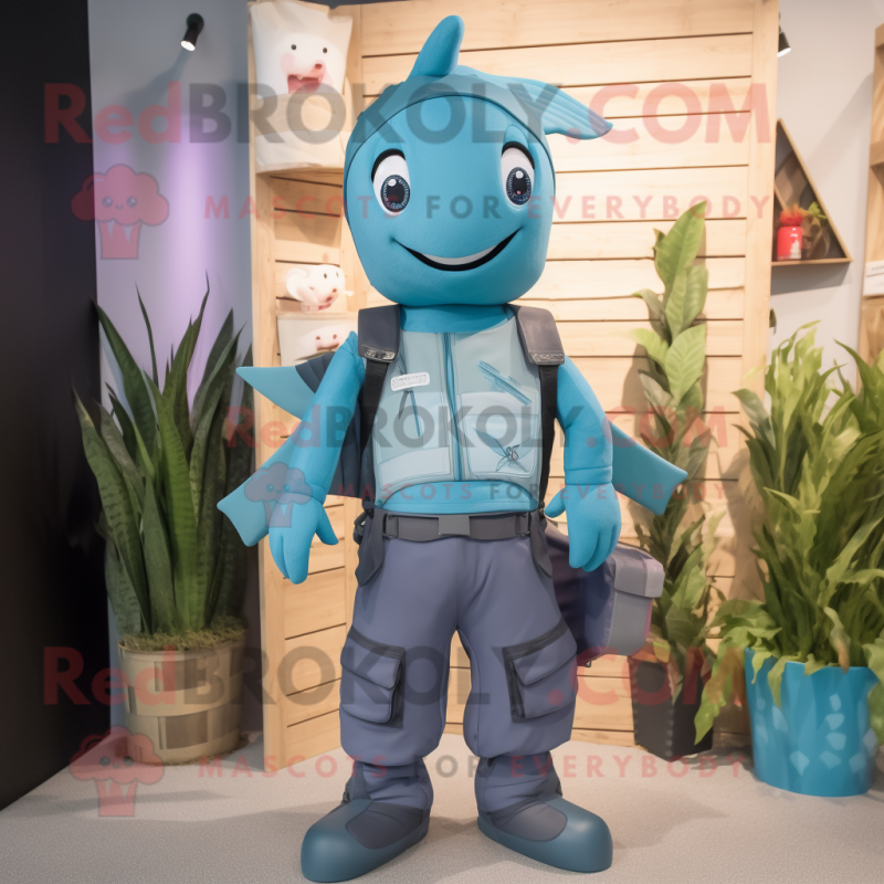 Cyan Swordfish mascot costume character dressed with a Dungarees and Backpacks