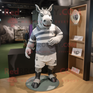 Gray Rhinoceros mascot costume character dressed with a Rugby Shirt and Cufflinks