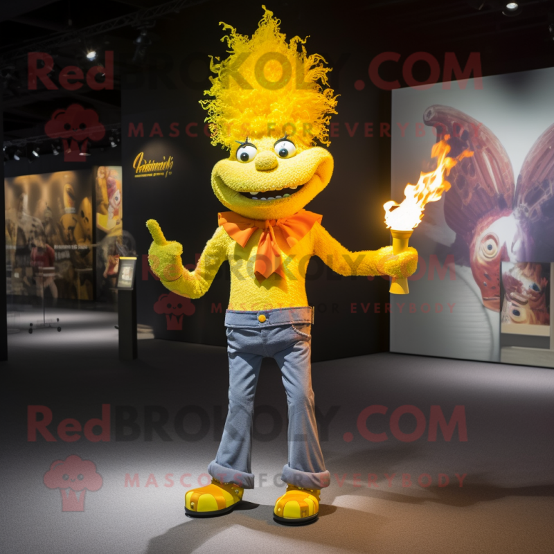 Yellow Fire Eater mascot costume character dressed with a Skinny Jeans and Handbags