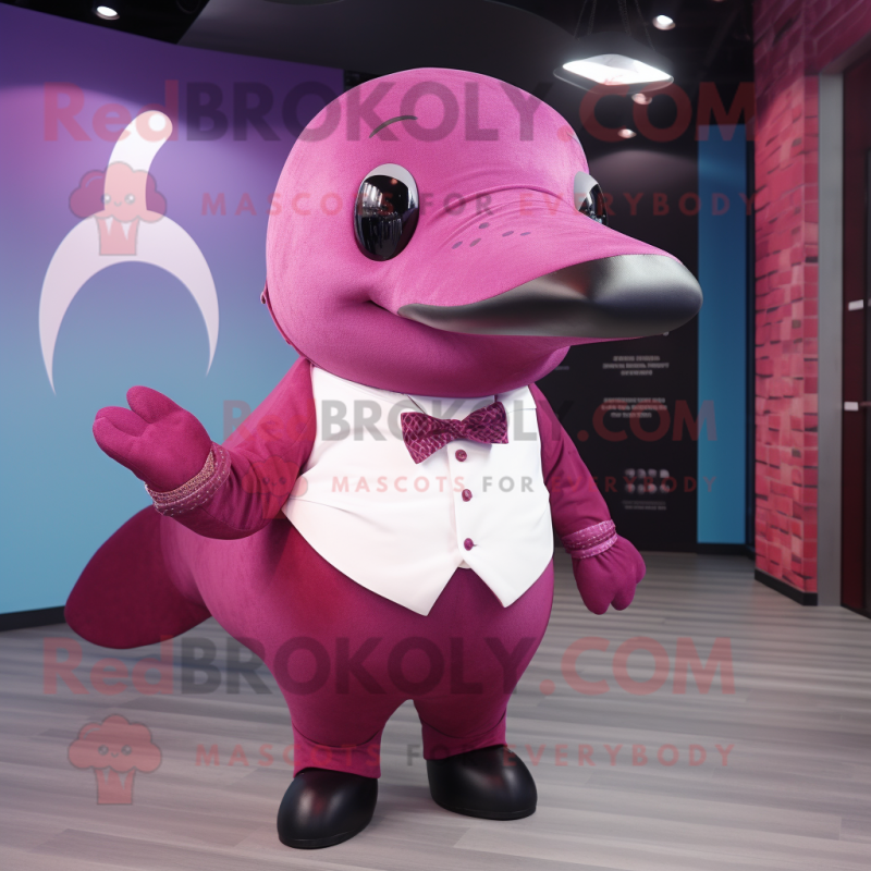 Magenta Whale mascot costume character dressed with a Henley Shirt and Bow ties Magenta Whale mascot costume character dressed with a Henley Shirt and Bow ties