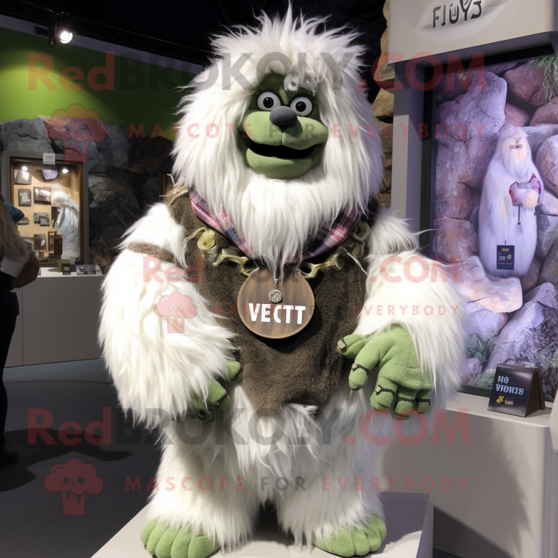 Olive Yeti mascot costume character dressed with a Flannel Shirt and Necklaces Olive Yeti mascot costume character dressed with a Flannel Shirt and Necklaces