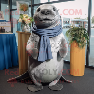 Gray Sea Lion mascot costume character dressed with a A-Line Dress and Scarves