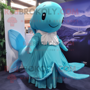 Cyan Humpback Whale mascot costume character dressed with a Mini Skirt and Wraps