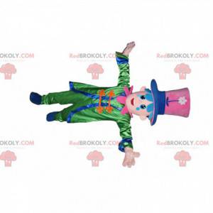 Snowman mascot with a green outfit and a large pink hat -