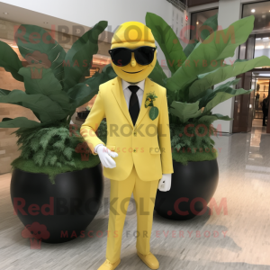 Yellow Spinach mascot costume character dressed with a Suit and Sunglasses