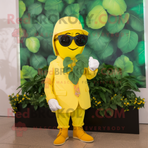 Yellow Spinach mascot costume character dressed with a Suit and Sunglasses