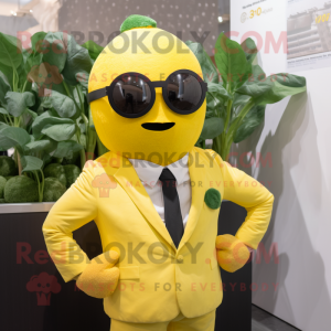 Yellow Spinach mascot costume character dressed with a Suit and Sunglasses