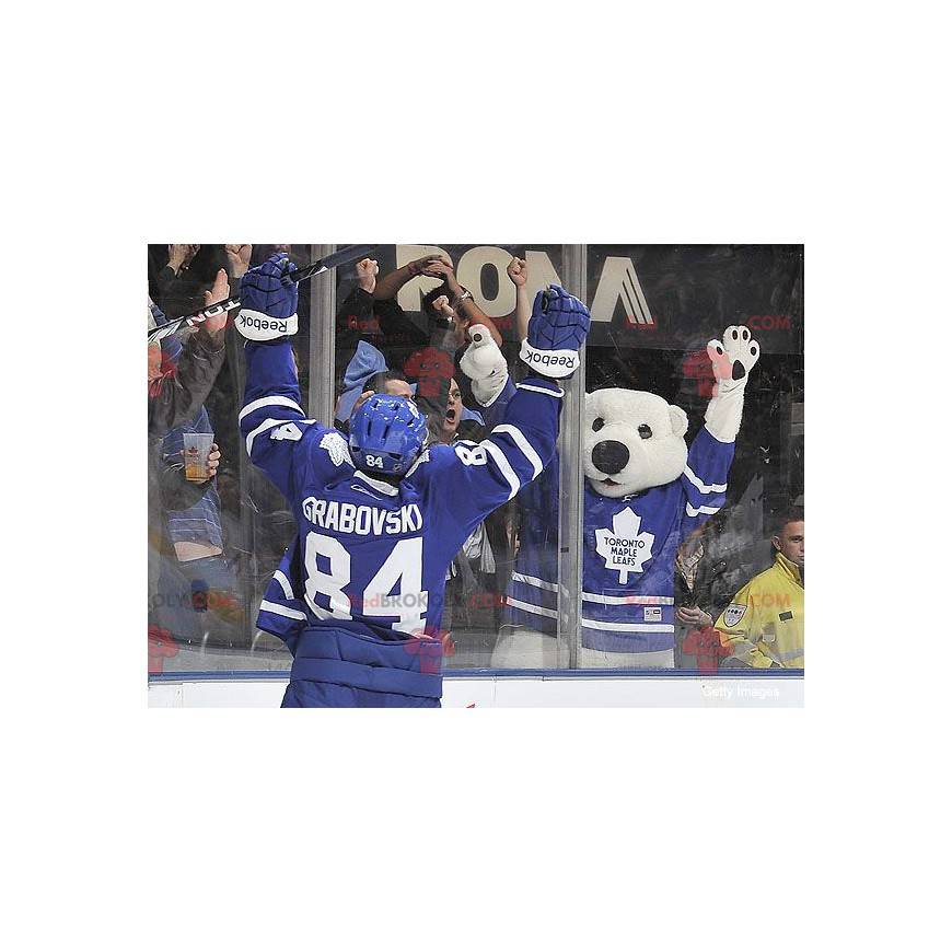 Mascotte d'ours blanc d'ours polaire en tenue de hockey -