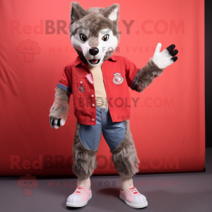 Red Wolf mascot costume character dressed with a Denim Shorts and Foot pads