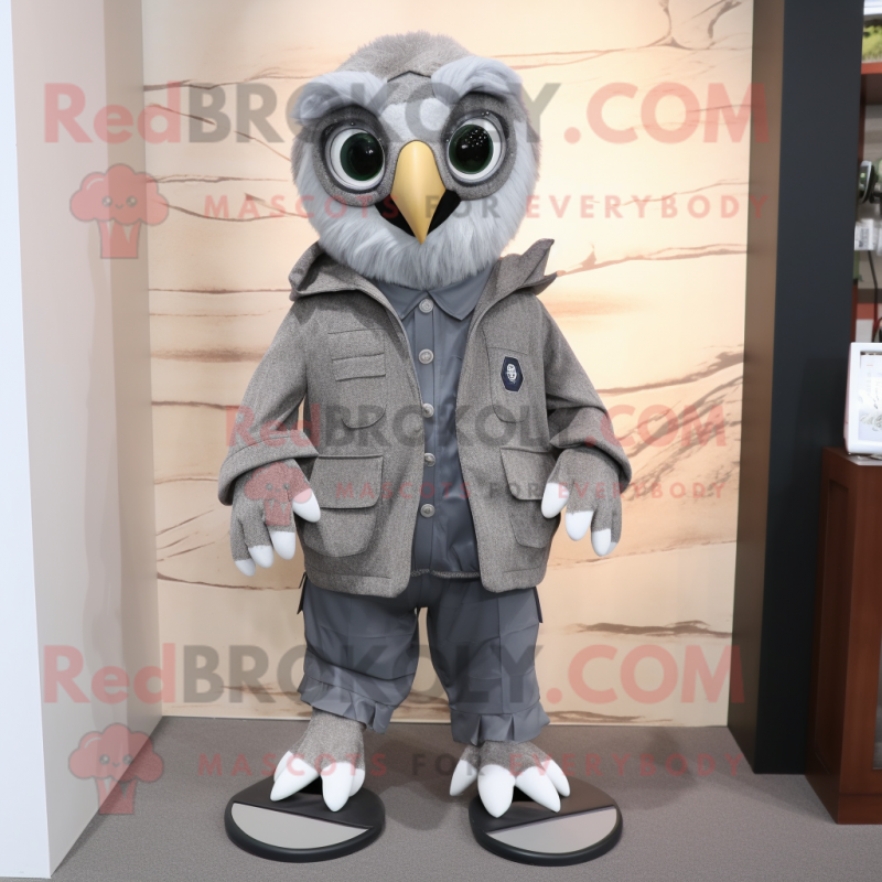 Gray Owl mascot costume character dressed with a Jacket and Shoe laces