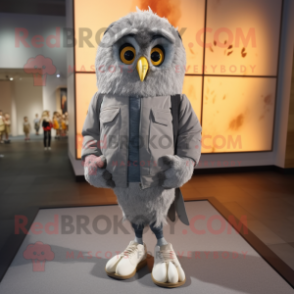 Gray Owl mascot costume character dressed with a Jacket and Shoe laces